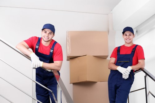 House movers helping a family move belongings in Hounslow