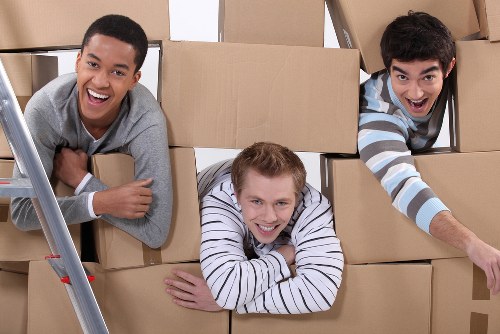 Furniture collection team handling access in Hounslow