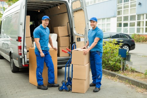Office furniture and IT equipment being prepared for transport